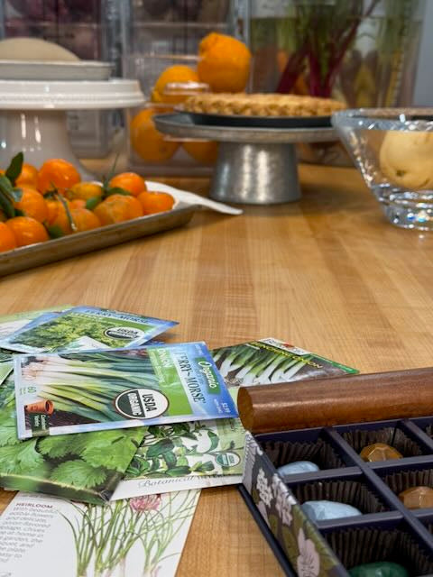 Vegetable garden seed packets seed starting tray wood table kitchen lifestyle home garden seeds kits spring planting supplies