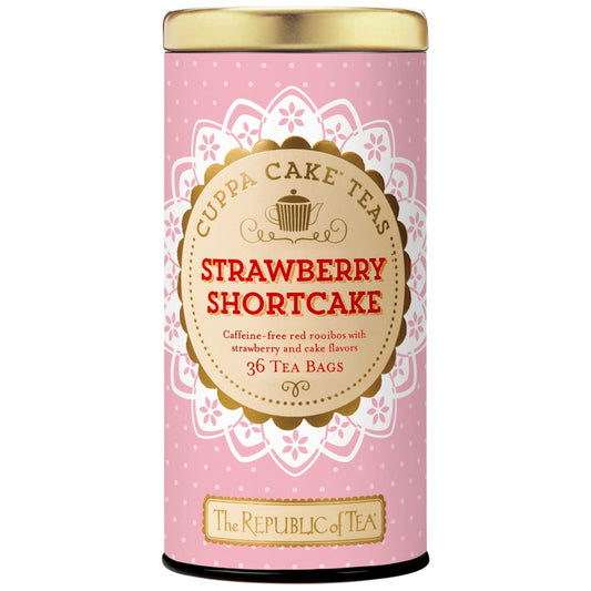 Pink tea canister with 'Strawberry Shortcake' flavor from Cuppa Cake Teas on a white background