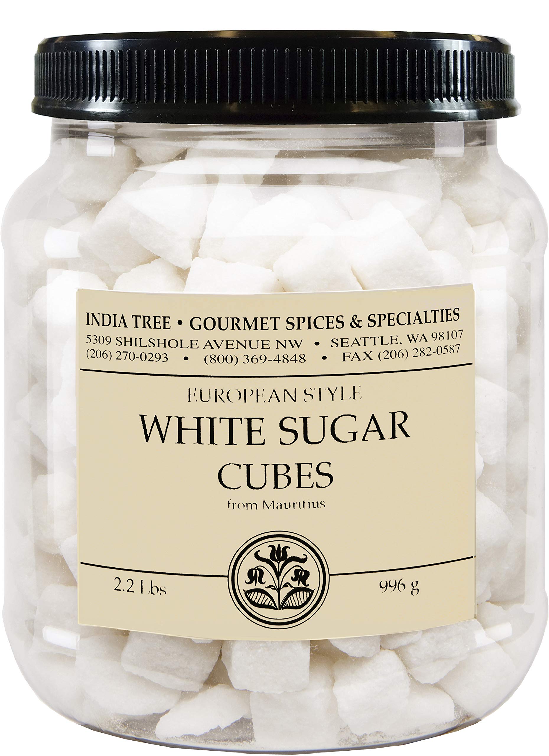 A clear plastic jar filled with white sugar cubes, topped with a black ribbed lid and a cream-colored label reading 'White Sugar Cubes' with the brand 'India Tree Gourmet Spices & Specialties'.